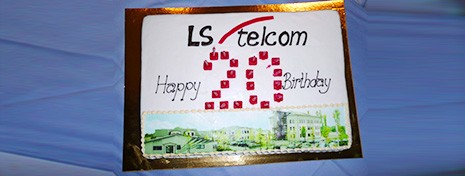 LS telcom celebrates 20 years in 2012. Cake with “LS telcom 20th Birthday” and company logo celebrating 20 years.